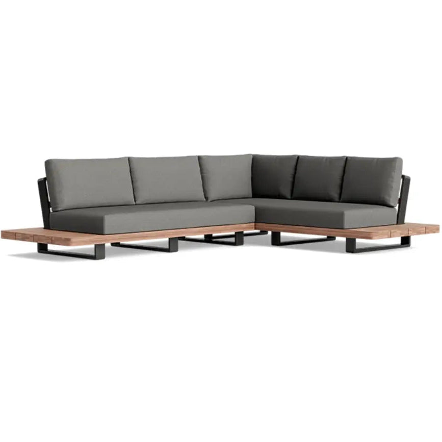 Sectional sofa with gray cushions and wooden base on a white background