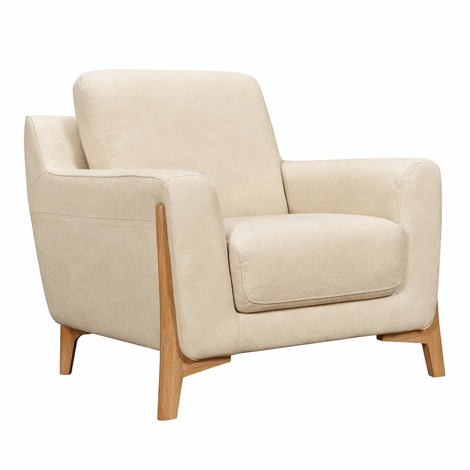 Beige armchair with wooden legs on a white background