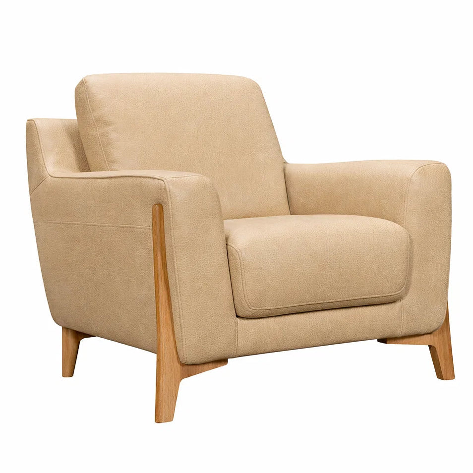 Beige armchair with wooden legs on a white background
